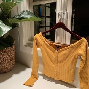yellow long sleeve shirt